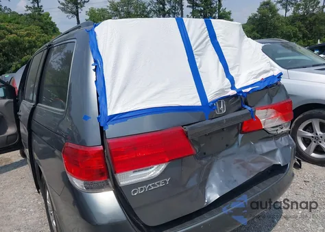 2010 Honda Odyssey Ex-L z USA, uszkodzony, nr VIN 5FNRL3H64AB087235